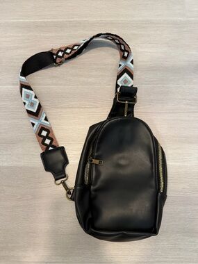 Black women’s Leather Crossbody Sling Bag with Patterned Strap
